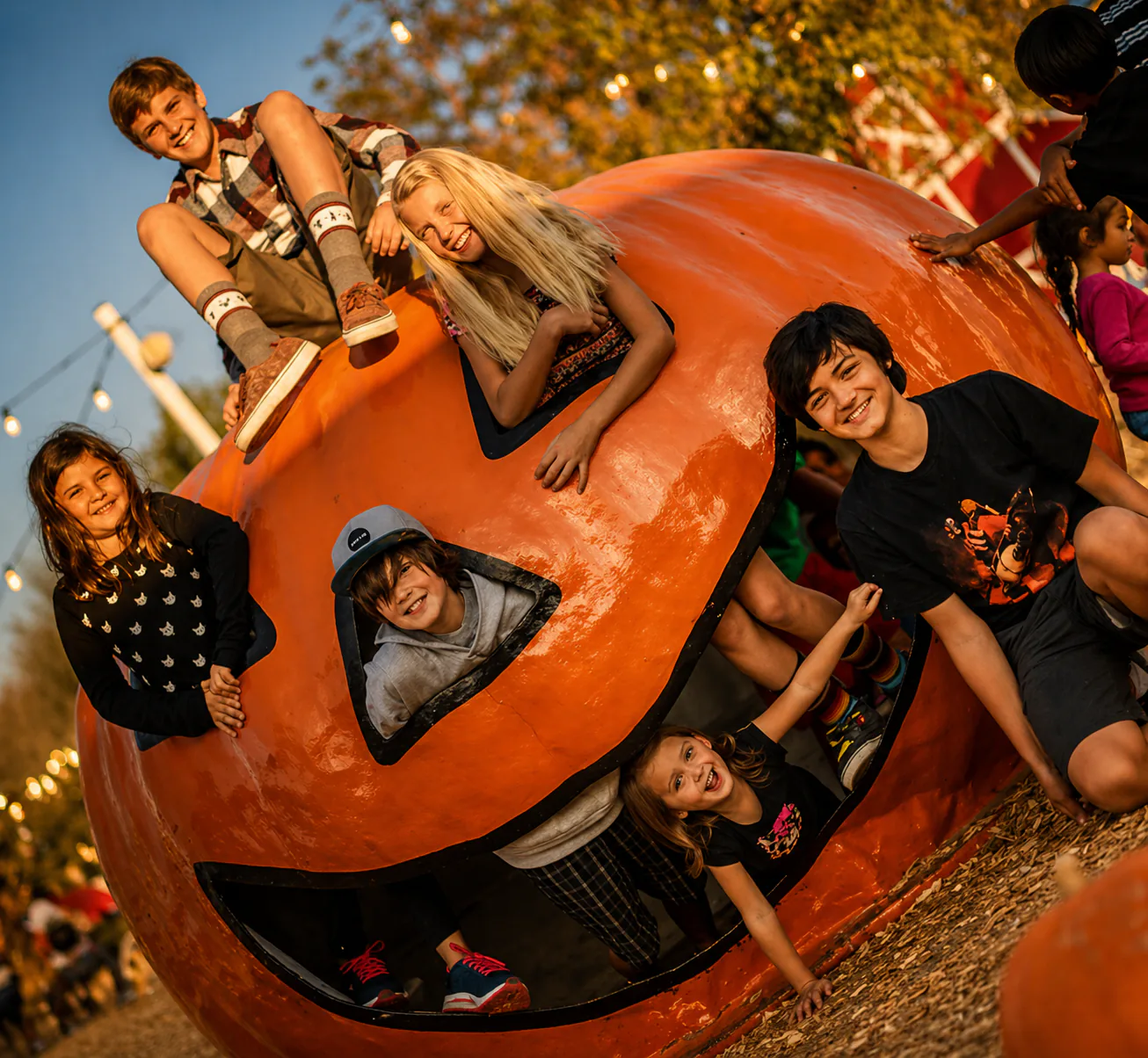 Families enjoying a Pumpkin City fundraising night